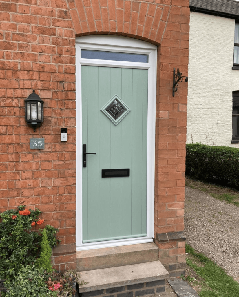 green door with a security light